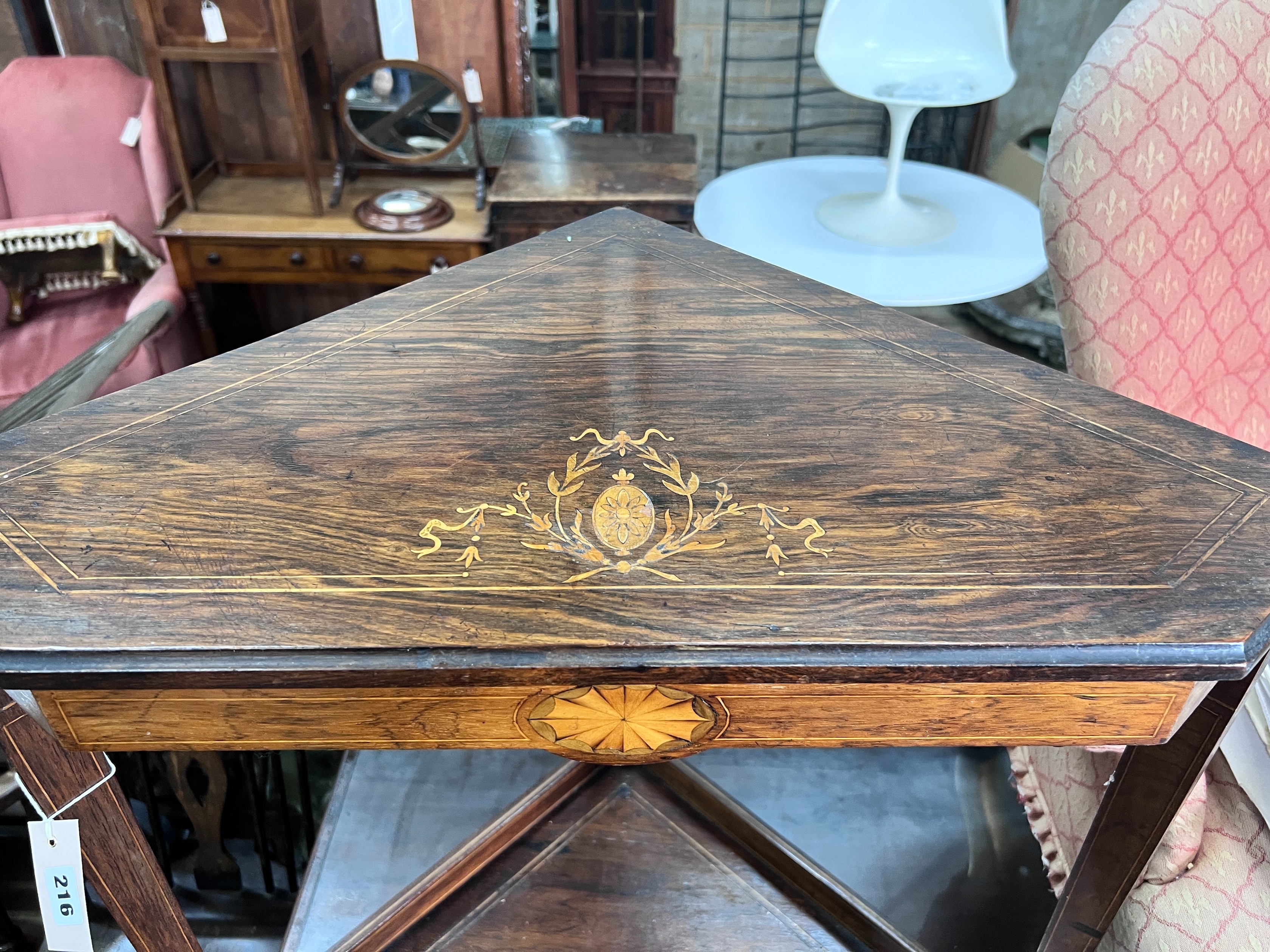 An Edwardian marquetry and rosewood corner table, width 69cm *Please note the sale commences at 9am.